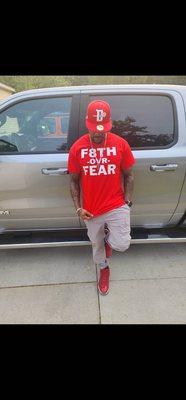 Handsome is rocking the popular "f8th ovr fear" tee