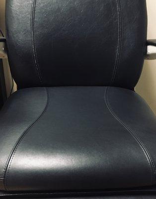 Exam chair in doctor's office.  Expertly repaired.