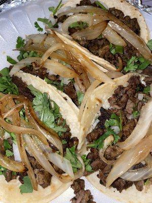 Carne asada tacos (no salsa) with grilled & reg onion