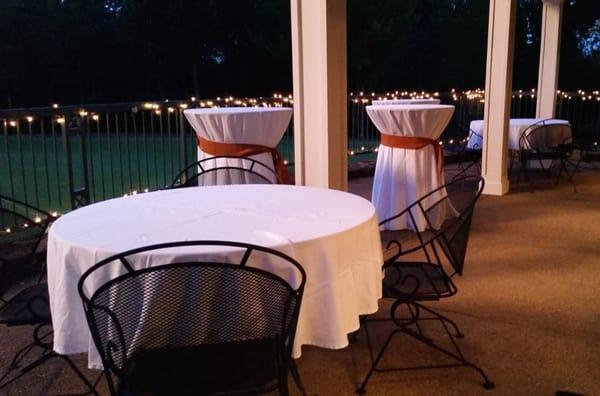 Back patio of the Banquet Hall set up for a wedding reception.