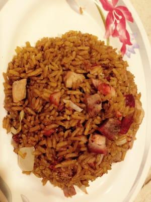 Pork Fried Rice. With marinated pork chunks, onions, bean sprouts, and soy-sauce seasoned rice.