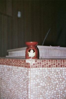 View of the Pastor's Candle Holder; Candle Lit Inside.  Photo taken 7/7/10.