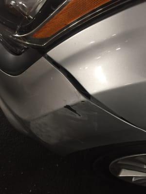 Scraped up, missing paint and a big crack, courtesy of Standard Parking at 6033 N Sheridan Chicago Il 60660