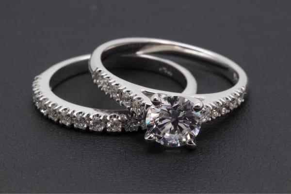 Custom diamond engagement ring and wedding band bridal set that I bought at the Jewelry store Luxe Whole sale Diamonds!