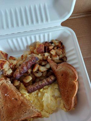 Eggs with home fries, sausage and toast