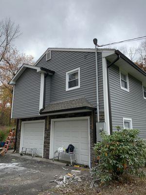 Siding and Musket Brown Gutters