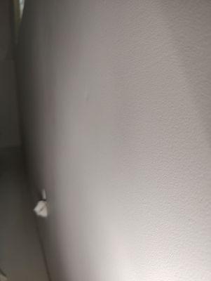 Multiple dents in wall