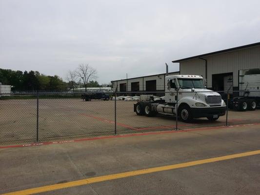 Maintenance building and the parking lot.