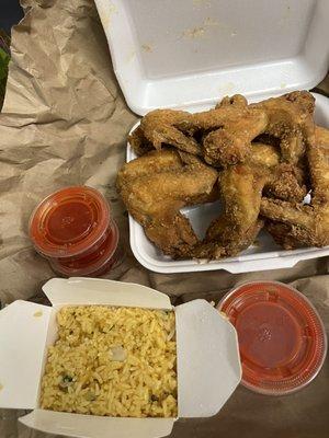 12 piece Chicken Wings (mumbo sauce on side), along with fried rice