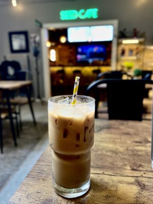 Iced vanilla latte with oatmilk