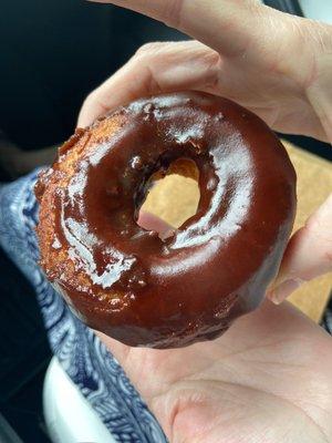 Chocolate dipped donut.