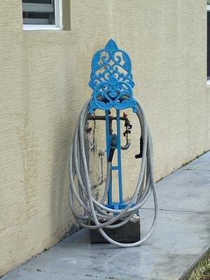 A garden hose stand.