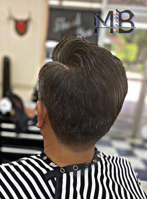 Comb Over Scissor Cut with a Tapered back .