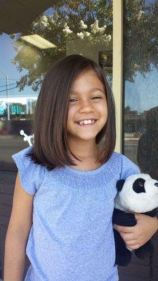 Laura cut my daughters hair. She was so patient with her. It came out great!