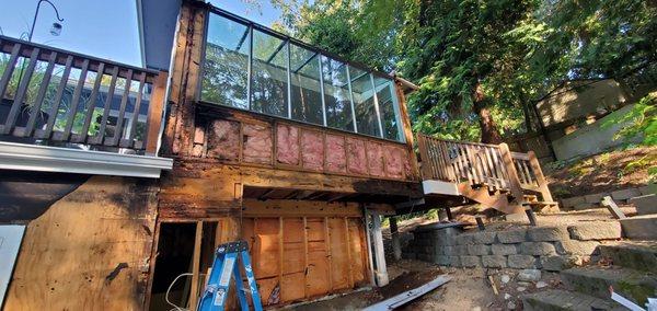 Water damage and rotten wood at the dining room.