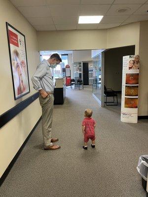 Dr Geary explaining the importance of annual eye examinations to a pediatric patient.