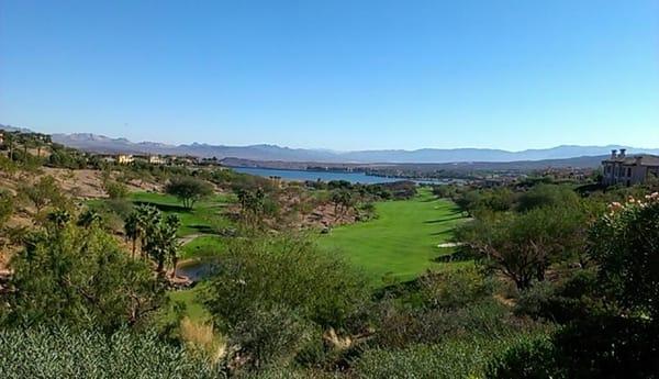 From the second story balcony of this lovely home you can lounge and enjoy this beautiful view of the golf course and Lake La...