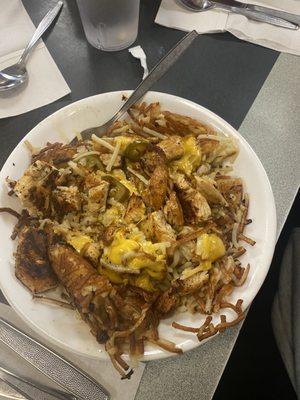 Specialized hash-brown bowl with grilled chicken and jalapeños.