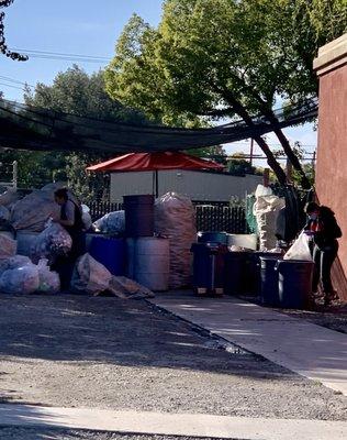 Recycling center is tucked in the back next to Contreros Market.