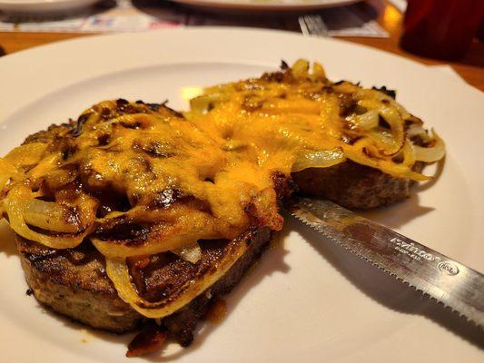 Texas Meatloaf Special - two pieces of good meatloaf topped with grilled onions, cheddar cheese, bacon and BBQ sauce