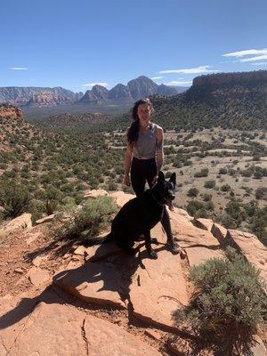 Aimee , physical therapist at Iron Lion with Theo the black German Shepard