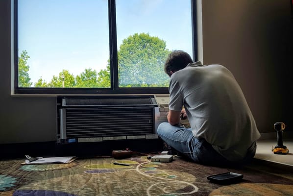 Robert Evans installing an Energy Management system.