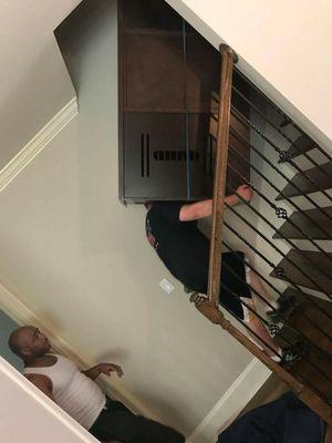 Heavy Entertainment Center up all wood stairs