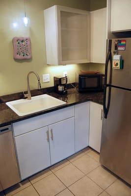 Right side of kitchen. Just one glass door provides elegant contemporary touch without the expense of all glass doors