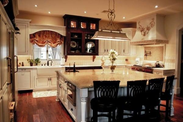 Custom kitchen counter tops and back splash. Massive island has a upgraded edge to compliment it's size.