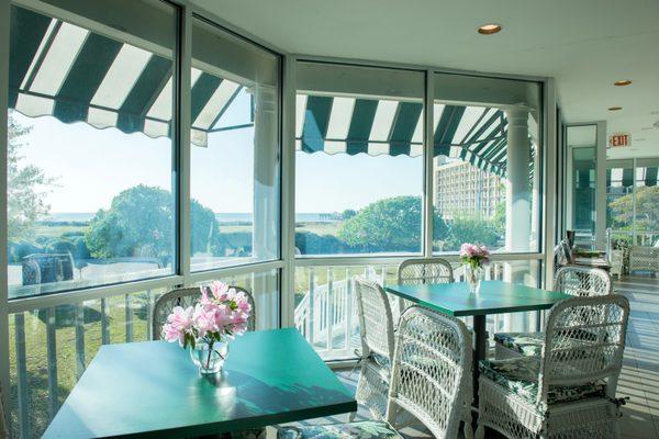 Enjoy a view of the ocean from the Carolyn Burroughs tea porch in between viewing exhibitions.