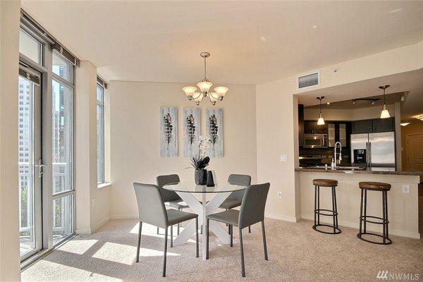 Small dining areas feel spacious staged with sleek contemporary furnishings