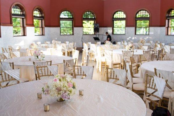 Beautiful ivory, gold and silver linens, gold chiavari chairs and ivory sashes took my venue to the next level