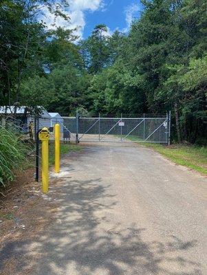 Second entrance and gate to further buildings.