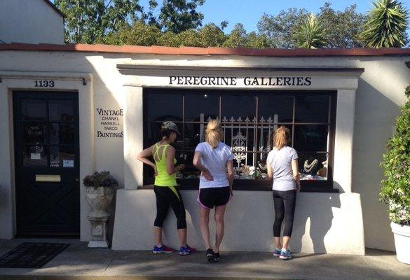 The lady's stop their run to admire our window.