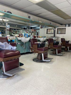 An old style, neighborhood barber shop with charm and great customer service.