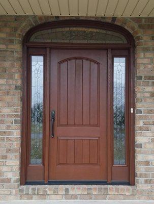 Therma-Tru Front Entry door Unit with sidelites and arched transom.