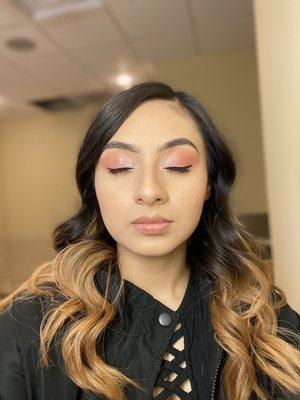 Hair and makeup for graduation. Soft glam look. Requested no lash extensions with a small wing: