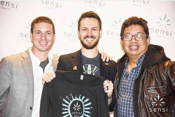 Jim (left) and Art (right) with partner at a cannabis business networking event, in Massachusetts.