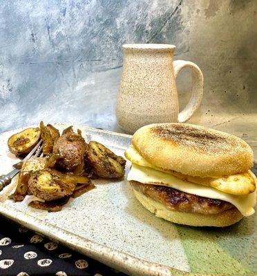 Sausage egg and cheese with potatoes a coffee. Can't go wrong.