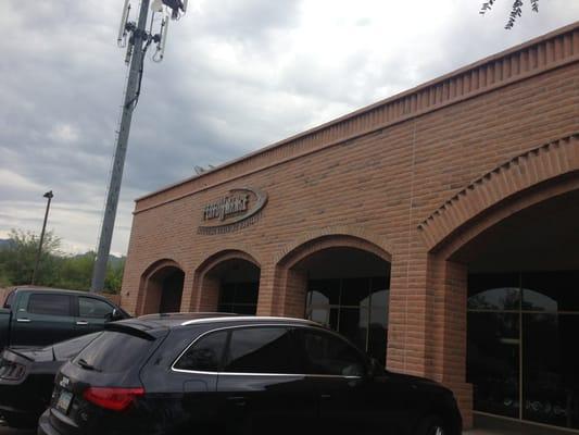 Front facade still has the sign from the previous gym, Performance Executive Fitness