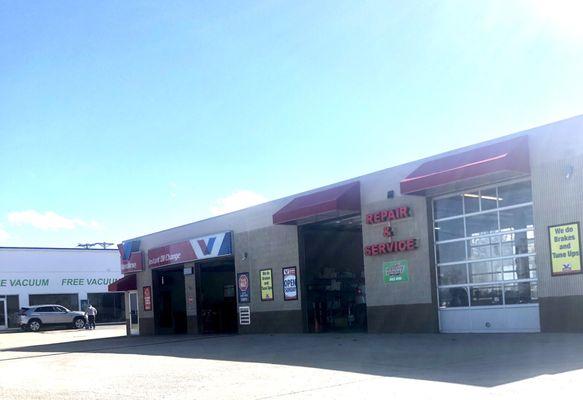 Car wash and car tint business in the same lot. I waited on the grass with my puppy while the car tires were rotated.