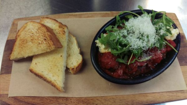 Skillet Meatballs, Pomodoro Sauce, ricotta and Parmesan with artisan toast