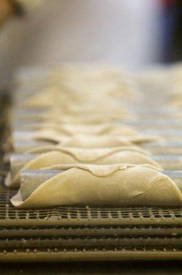 Cannoli shells ready to be turned into golden deliciousness