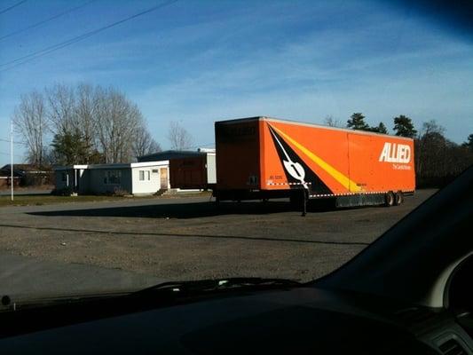 Allied loading cargo trucks on site