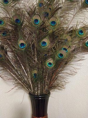 This Home arrangement is the peacock only at susans Home Gallery come and check it out