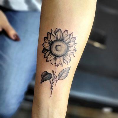 Sunflower with name  tattoo done by Jr 
Now Booking and Accepting walk-ins 
Call or come by for availability