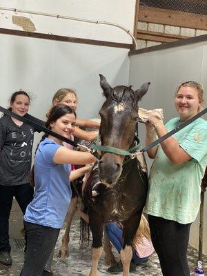 Waylon is enjoying his bath during camp!