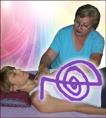 Sue applying Reiki symbol