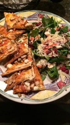 Mediterranean panini with chicken and side spinach salad