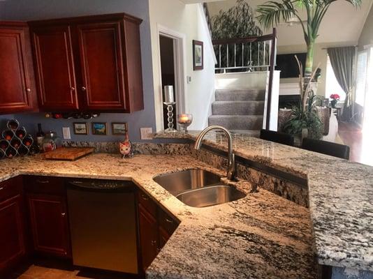 A glimpse of my beautiful granite kitchen. Granite Solutions did an amazing job with this geometric shape! Would HIGHLY recommend Alin!